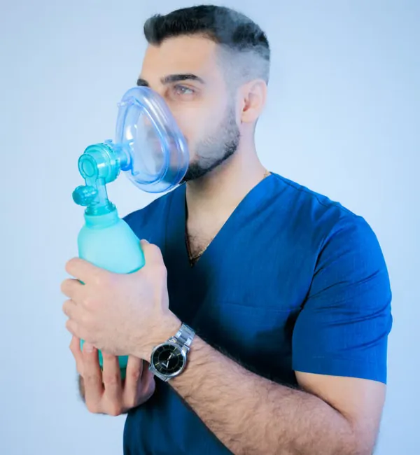 Patient visibly relaxed under nitrous oxide laughing gas sedation during dental procedure at Deekshu Dental