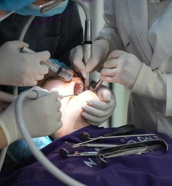 Dentist reassuring and consulting a relaxed patient before oral sedation dental procedure at Bangalore clinic